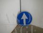 Vintage mandatory direction road sign, Italy 1990
