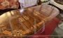 Palladian crank-extendable table with inlays of flowers and musical instruments                            
