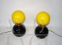 Pair of 70's table lamps with yellow glass spheres
