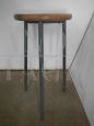 Low industrial stool in walnut
