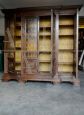 Vintage library bookcase with leaded glasses