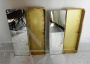 Pair of golden bathroom wall cabinets with mirror surface