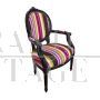 Pair of antique style armchairs with multicolored fabric