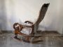 Antique Louis Philippe sculpted and carved rocking armchair
