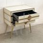 Small two-drawer dresser in ivory-colored glass and brass