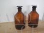 Pair of vintage glass apothecary bottles with stopper
                            