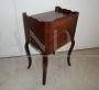 Small vintage bedside table in classic style with open compartment