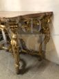 Roman Louis XV console in carved and gilded wood