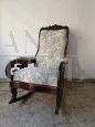 Antique Louis Philippe sculpted and carved rocking armchair