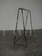 Vintage industrial stander clothes hanger with wheels from the 1950s