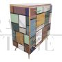 Multicolored glass tallboy dresser