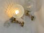 Pair of Seguso sphere wall lights in Murano glass and brass, 1950s