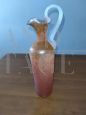 Orange artistic glass bottle vase