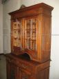 Antique cupboard with glass doors, early 20th century