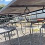 Garden set with 6 chairs and a large wrought iron table
