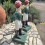 Pair of vintage American cast iron jockey garden sculptures