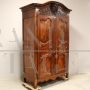 Antique Louis XV wardrobe or cupboard in walnut and cherry with carvings, 18th century