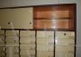 Large vintage office filing cabinet with 91 drawers and sliding doors