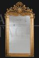 Antique Louis Philippe mirror in gilded and carved wood