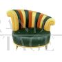 Pair of multicolored round design armchairs with asymmetrical backrest