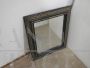 1920s mirror with black and gold lacquered frame