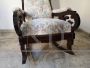 Antique Louis Philippe sculpted and carved rocking armchair