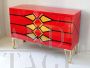 Deco style chest of drawers with geometric pattern