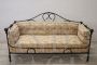 Antique sofa in wrought iron from the late 19th century        