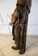 Antique religious wooden sculpture with the figure of a saint, 18th century