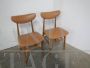 Pair of vintage chairs in beech and brown imitation leather, 1950s     