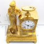 Empire Parisian clock in gilt bronze, signed and dated 1819