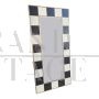 Backlit mirror in black and white glass