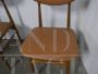 Pair of vintage chairs in beech and brown imitation leather, 1950s