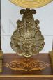 Antique Charles X clock in precious exotic woods, France 19th century