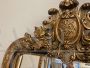 Antique French Louis Philippe mirror, gilded and black lacquered, 19th century