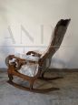 Antique Louis Philippe sculpted and carved rocking armchair