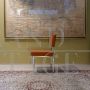 Vintage chair in metal and orange fabric