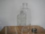 Vintage glass laboratory bottle with stopper