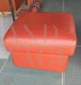 Pair of ottomans designed by Matteo Grassi in orange leather