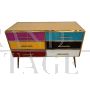 Dresser with six colored glass drawers
