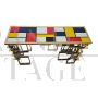 Double-sided console in Murano glass with geometric base in chrome-gold steel