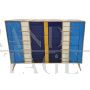 Dresser with 4 drawers covered in blue, white and yellow glass