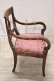 Antique Directoire armchair from the end of the 18th century in carved walnut