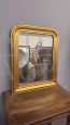 Antique gilded countertop mirror from the 19th century