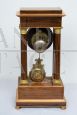 Antique Charles X clock in precious exotic woods, France 19th century