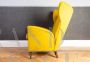 Pair of ISA armchairs covered in ocher yellow velvet