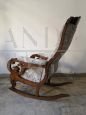 Antique Louis Philippe sculpted and carved rocking armchair