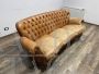 Vintage Chippendale leather sofa with tufted backrest