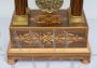 Antique Charles X clock in precious exotic woods, France 19th century