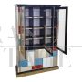Large bookcase covered in colored glass and illuminated